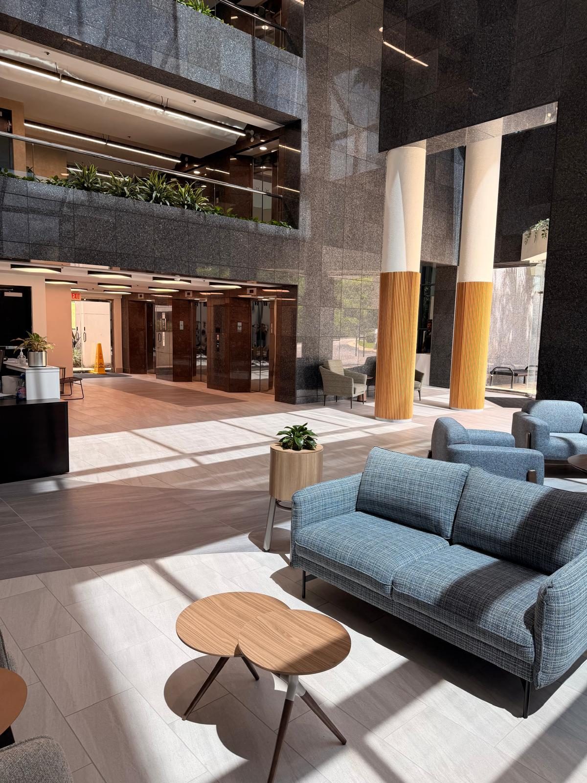 Finished lobby with furniture in place on the new porcelain floor
